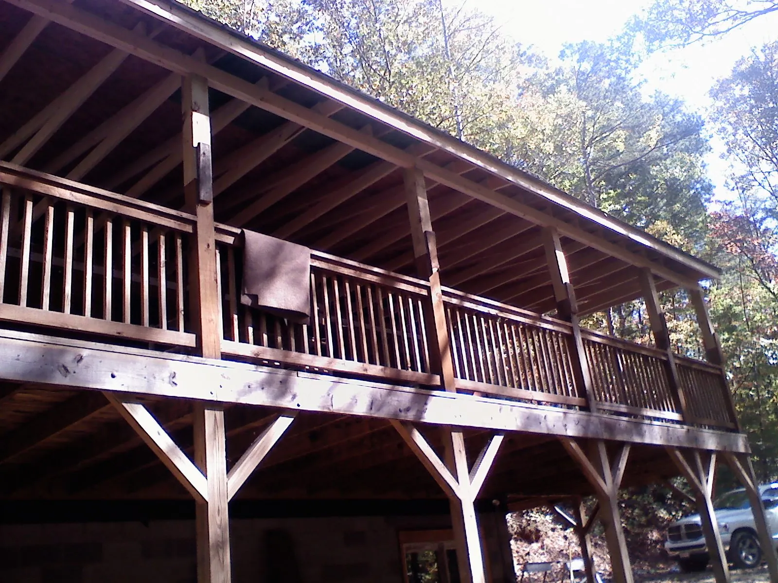 Timber framing under a new elevated porch and deck — Roof Leak Repair in Prosper by Roofing Brothers